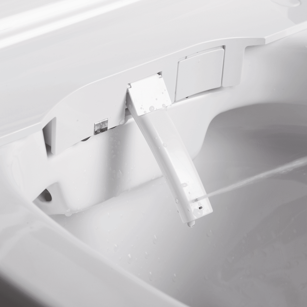 Close-up of the extended cleansing nozzle on the SUPERIOR 7012B smart toilet